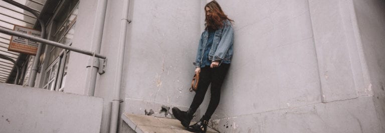 Girl standing outside hating herself