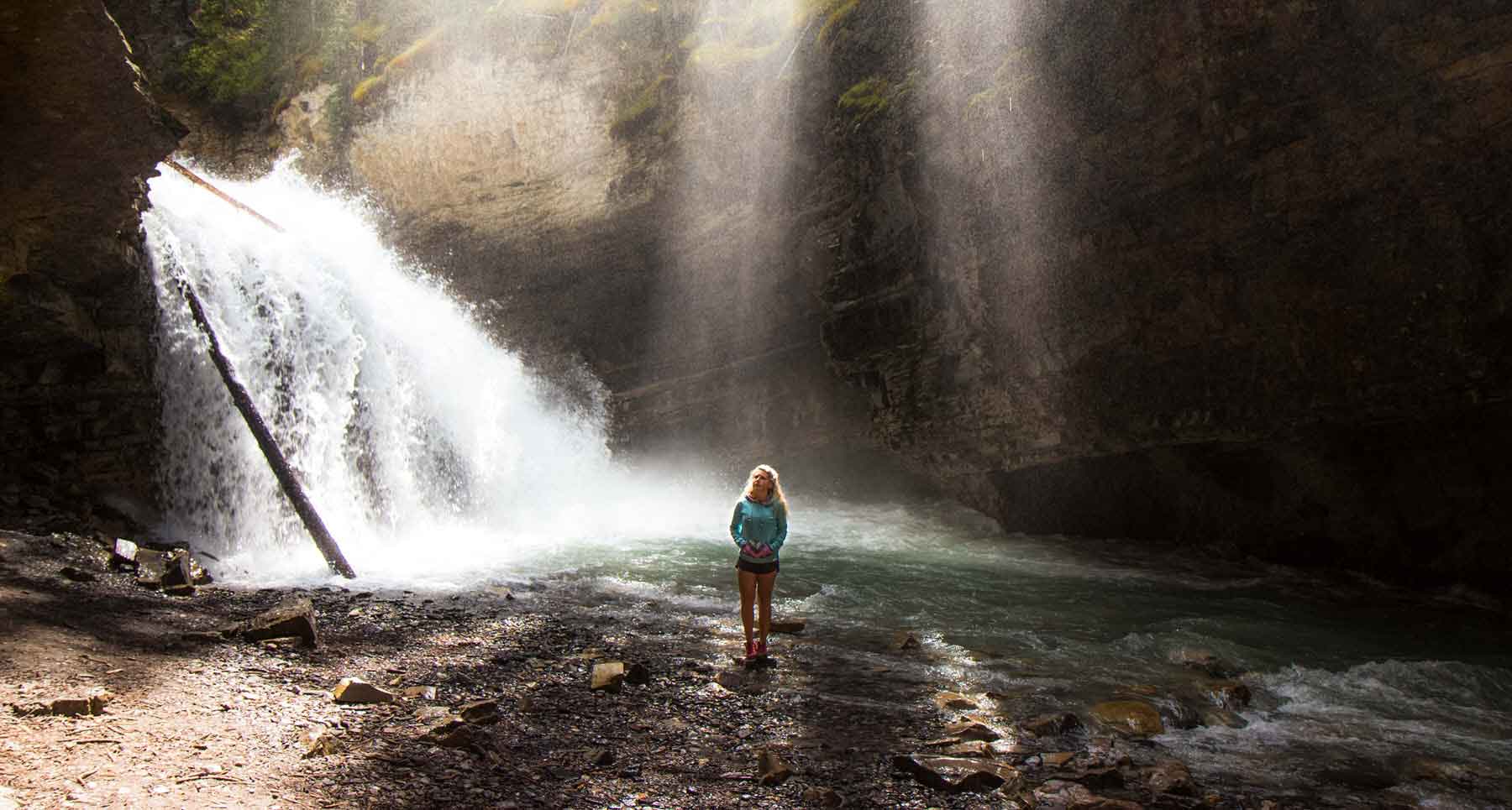 girl-seeking-Gods-help-by-a-waterfall