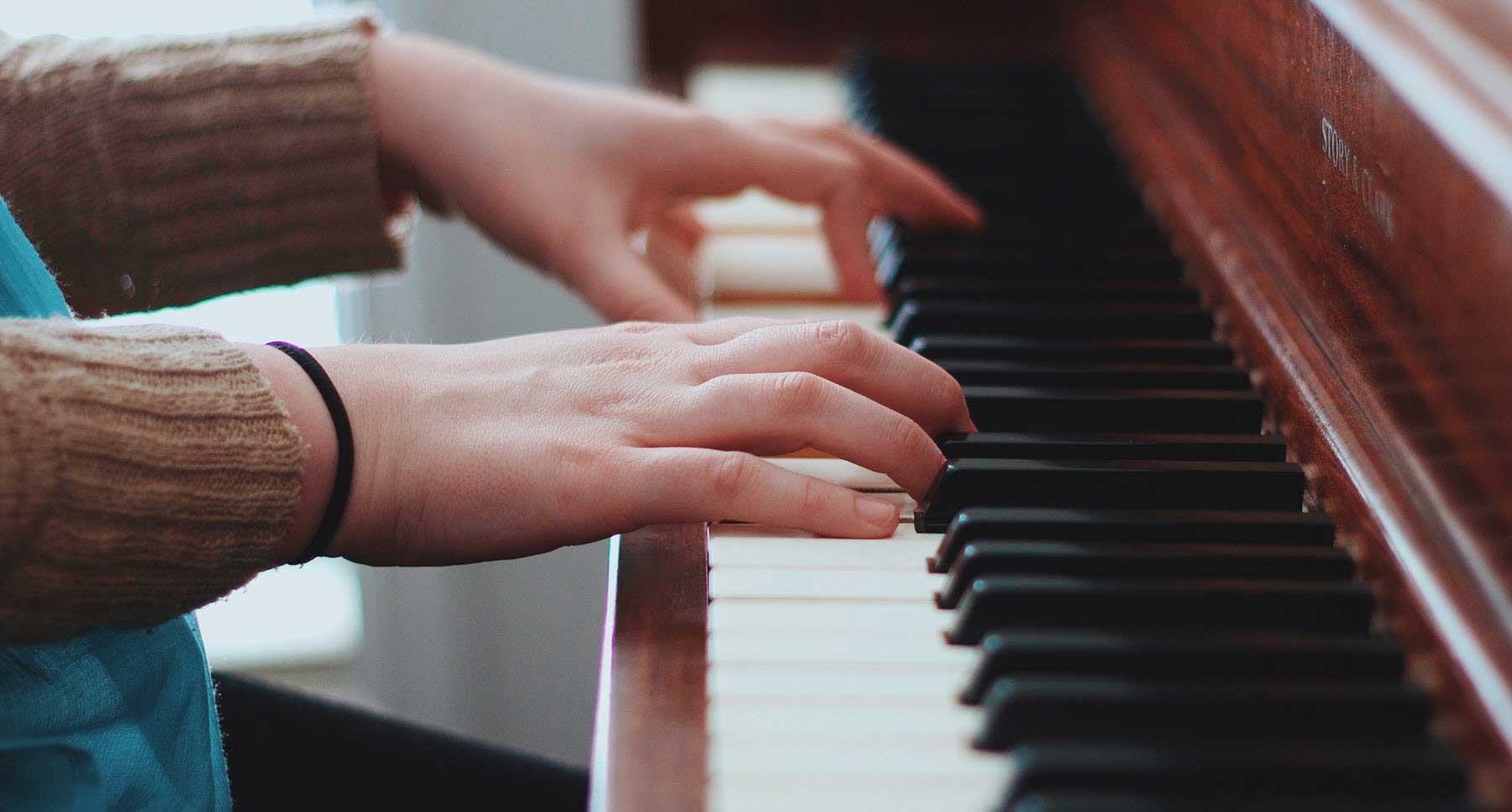 Woman Playing a Piano at Church