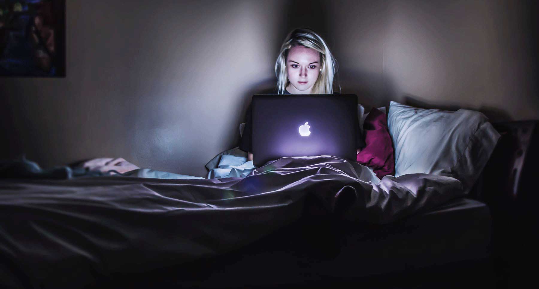 woman-in-her-bedroom-addcited-to-masturbation-pornography-on-computer