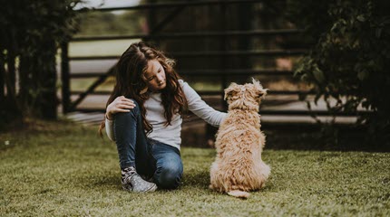 TheHopeLine Sad girl with dog How to Forgive a Parent Who Abandoned You