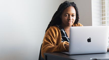 Girl doing online counseling in college