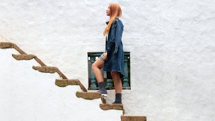 Girl walking up the stairs